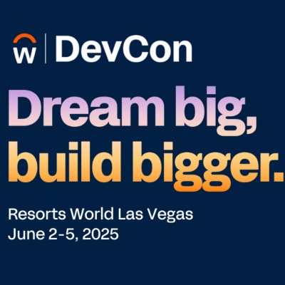 DevCon. "Dream big, build bigger." June 2-5, 2025, Las Vegas. Man at computer smiling.